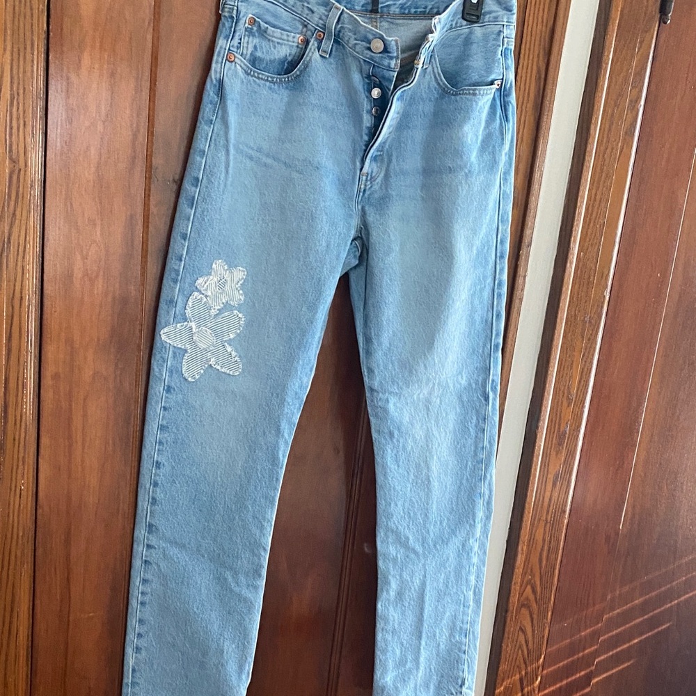 Levi’s 501 button fly Light Blue Women's Denim Jeans with Floral Patch